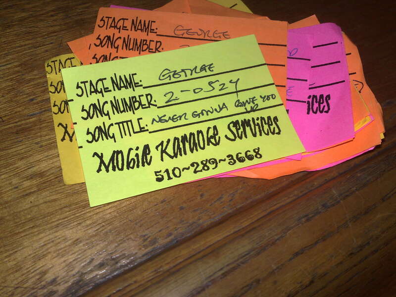 Some tickets in a karaoke, where one of them is for singing Never Gonna Give You Up.