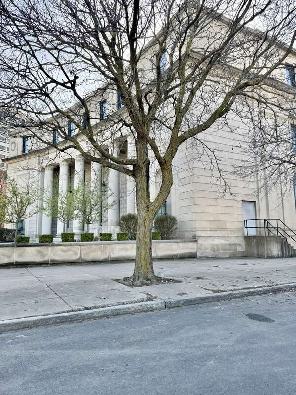 Built in 1928, this Classical Revival-style building was designed by James A. Wetmore to serve as a United States Post Office and Courthouse for the city of Syracuse, New York.  The building is clad in limestone with rustication at some sections of