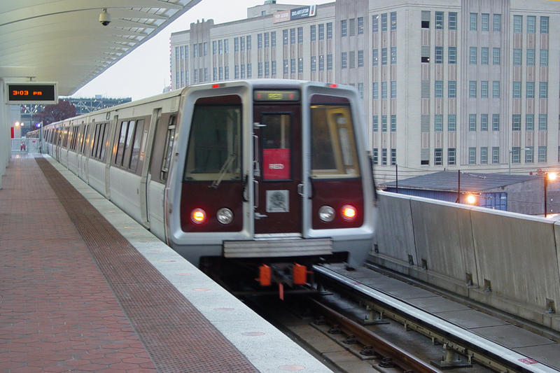 A Red Line train departs New York Avenue-Florida Avenue-Gallaudet University (now NoMa-Gallaudet University) station in Washington, DC.

Ben Schumin is a professional photographer who captures the intricacies of daily life.  This image may be used
