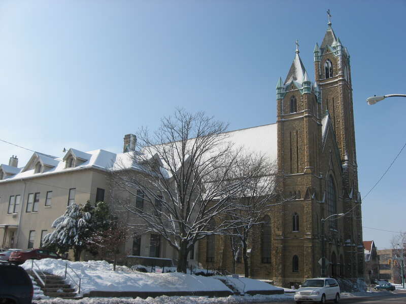Front and eastern side of St. Raphael's Catholic Church, located at 225 E. High Street in Springfield, Ohio, United States.  Built in 1892, it is listed on the National Register of Historic Places.