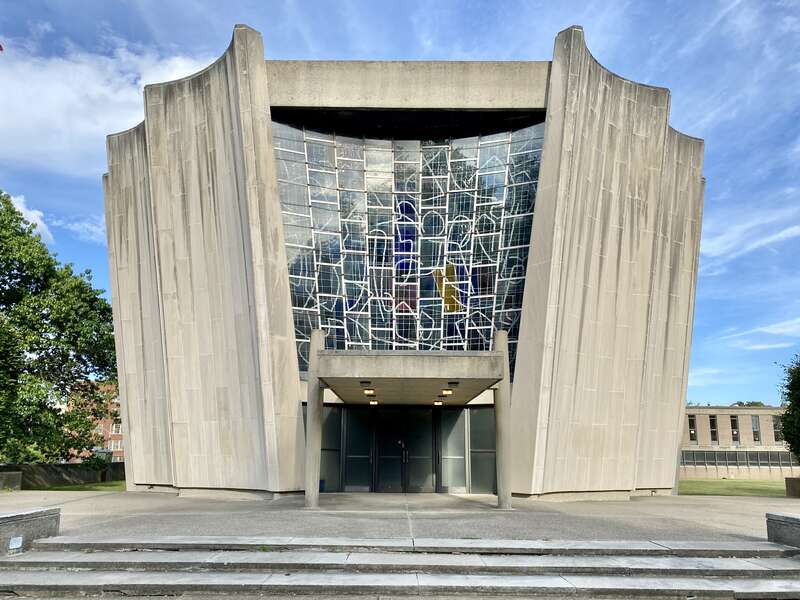 Built in 1964-67, this modern synagogue was designed by Max Abramovitz to house Temple Beth Zion, one of the oldest Jewish Reform congregations in the United States, founded in 1850.  The building replaced a previous synagogue, built in 1890, which