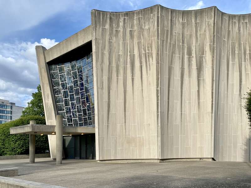 Built in 1964-67, this modern synagogue was designed by Max Abramovitz to house Temple Beth Zion, one of the oldest Jewish Reform congregations in the United States, founded in 1850.  The building replaced a previous synagogue, built in 1890, which