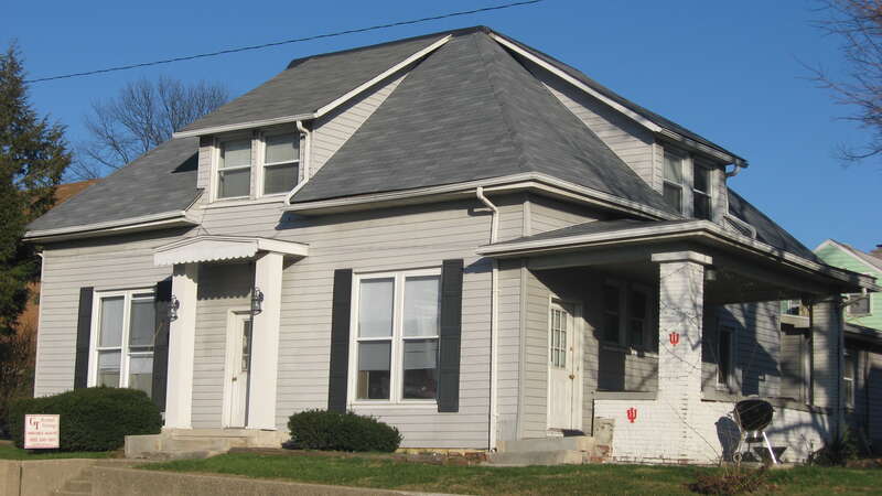 Front and southern side of the house located at 620 N. Walnut Street in Bloomington, Indiana, United States.  Built in 1915, it is part of the locally-designated Cottage Grove Historic District.