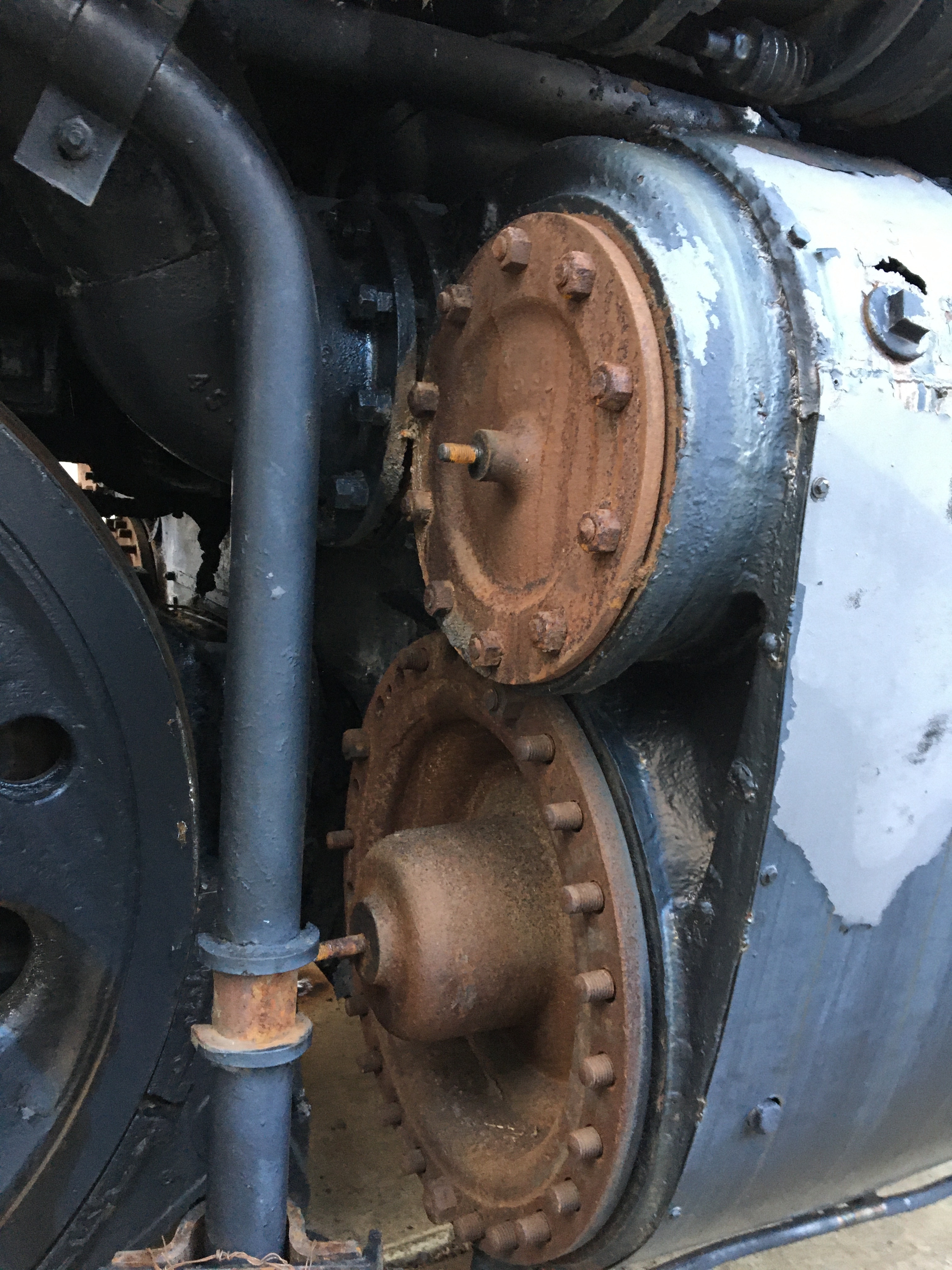 Close up view of rusted cylinder heads near the train's wheels.
&quot;Big Boy's&quot; cylinder heads on one of its steam chests.
Keywords: locomotive; uprr big boy 4012; restoration; uprr; steamtown; 4012; steamtown NHS; big boy 4012; train