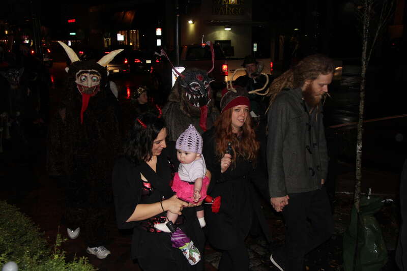 St Nicholas leading the parade, warning children to behave and beware of the Krampusnacht.