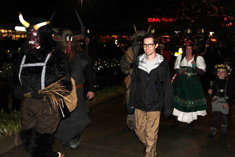 St Nicholas leading the parade, warning children to behave and beware of the Krampusnacht.