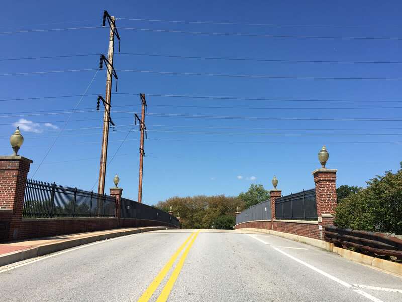 View west along Maryland State Route 564 (Lanham Severn Road) between 11th Street and Chestnut Avenue as it crosses over a rail line in Bowie, Prince Georges County, Maryland