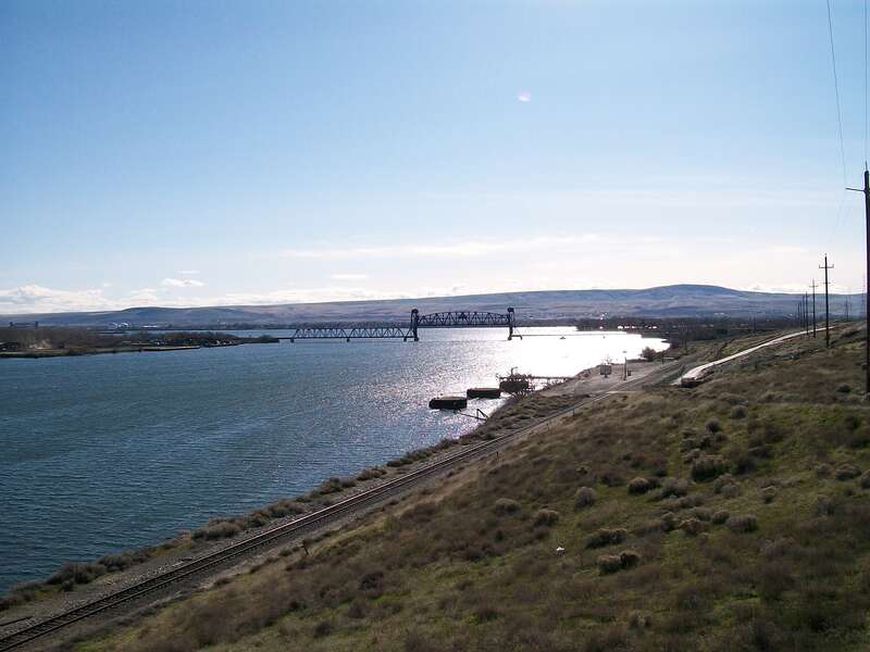 BNSF Railway drawbridge crossing the Snake River. The confluence of the Snake and Columbia rivers can be seen in the background.
