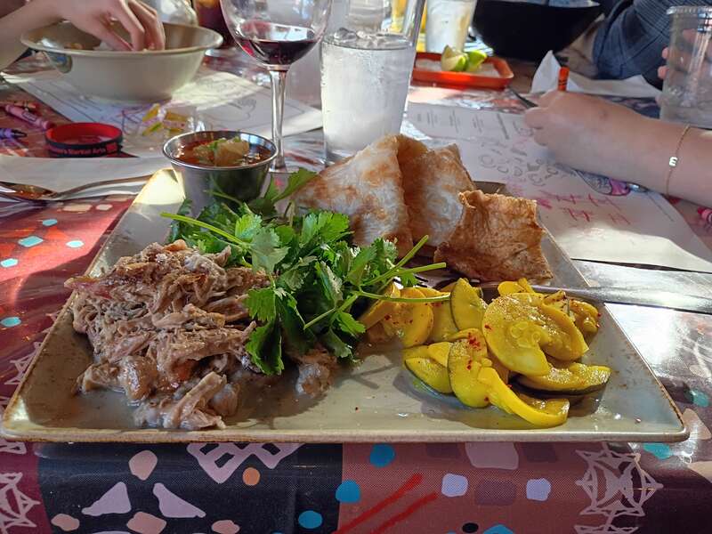 Whole Smoked Pig tossed in coconut milk, lemongrass, and ginger, smoked cracklin', house pickles, roti, and Pineapple Nuoc Cham
MoPho
Asian fare with a Creole influence

514 City Park Avenue, New Orleans, Louisiana