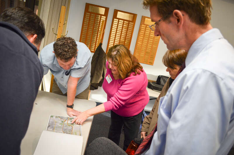 Pam Hill (center) with the U.S. Army Corps of Engineers Sacramento District, discusses potential environmental impacts from riverbank erosion repairs during a public workshop in Chico, California Feb. 4, 2015. A series of four outreach meetings were