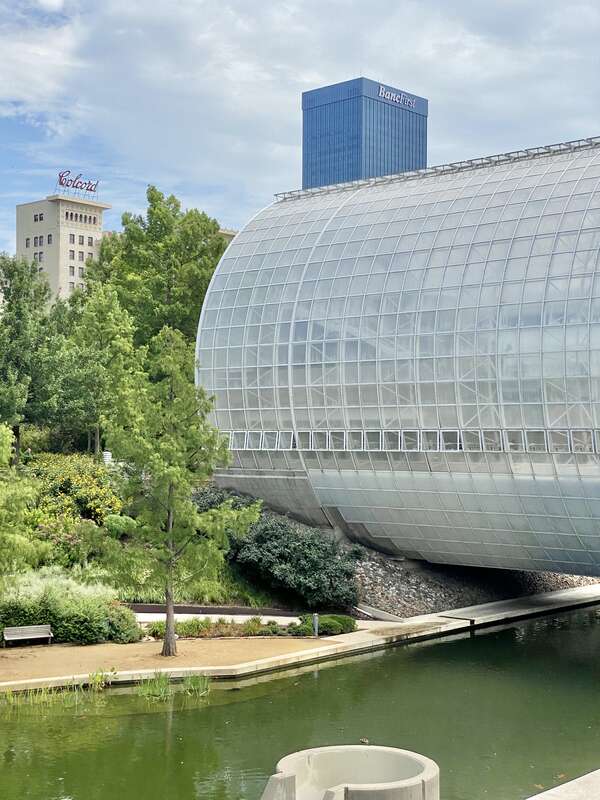 Built in 1983-1985, this Modern building was designed by Conklin and Rossant as part of the construction of the Myriad Botanical Gardens, which began construction in 1971.  The building consists of a large cylinder that is 224 feet (68 meters) long
