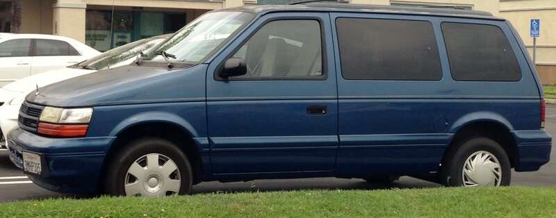 An old Dodge Caravan parked in the Arby's parking lot. Sadly, I don't see very many of these boxy minivans on the streets anymore.