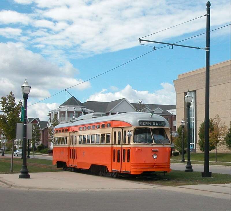 Kenosha streetcar 4615 (ex-Toronto 4615), painted in the colors of the former Johnstown Traction Company (of Johnstown, Pennsylvania) and displaying a historic Johnstown destination (Ferndale) on its rollsign.  It is eastbound on 56th Street at  1st