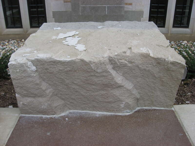 A block of limestone at a patio on the northern side of the Indiana Memorial Union.