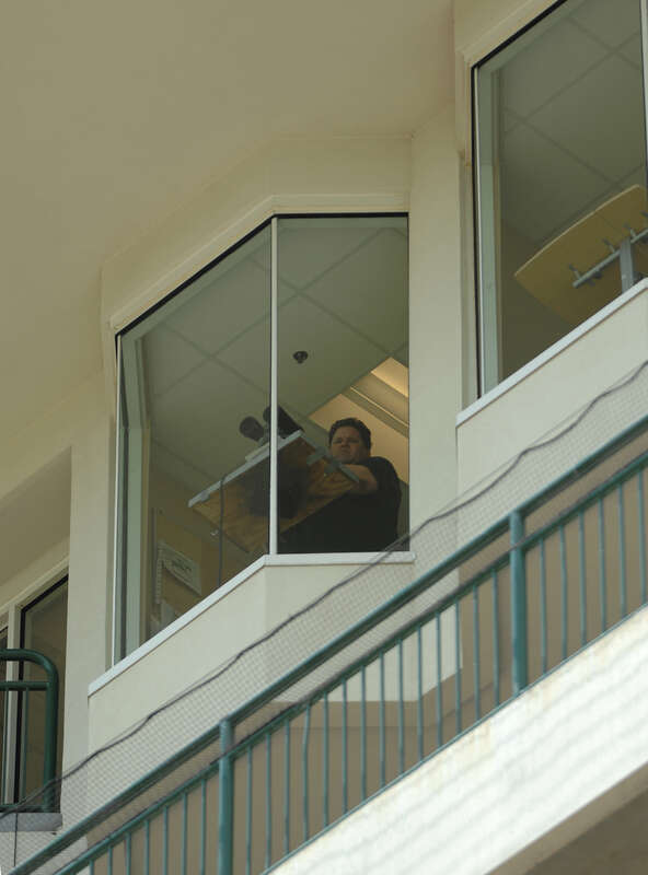 Churchill Downs announcer, Luke Kruybosch, at work shortly before his death at age 47.