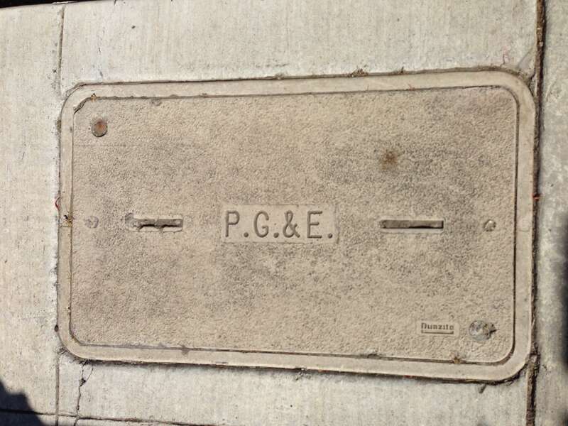 Pacific Gas &amp;amp; Electric street hole cover in Mountain View, California
