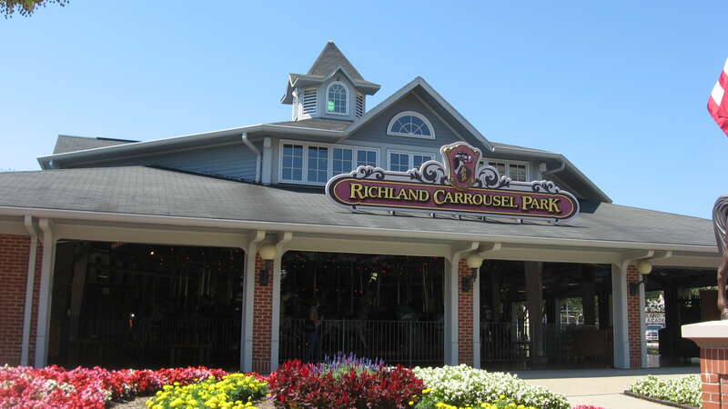 View from the northeast of the Richland Carrousel Park, located on the southwestern corner of the junction of Main (State Route 13 and Fourth Streets in Mansfield, Ohio, United States.