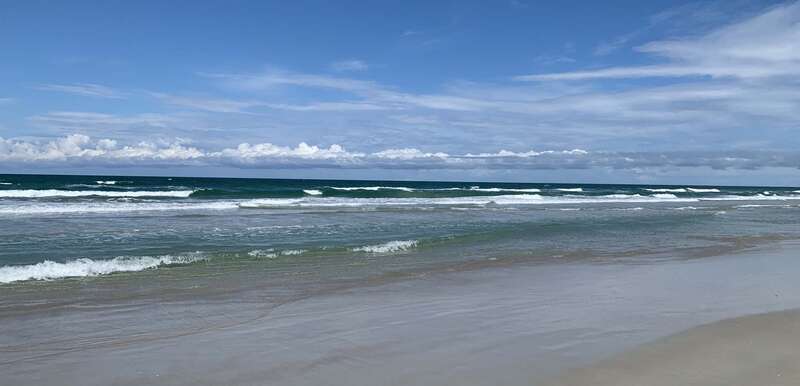 The gently sloping beach at New Smyrna Beach, Florida, provides excellent bodysurfing conditions.