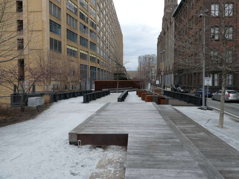 The Rail Park bridge over N 13th Street seen in March 2022. Of the five spans of the bridge, the right two served the Willow and Noble Street Branch, while the left three led to the Reading Terminal.