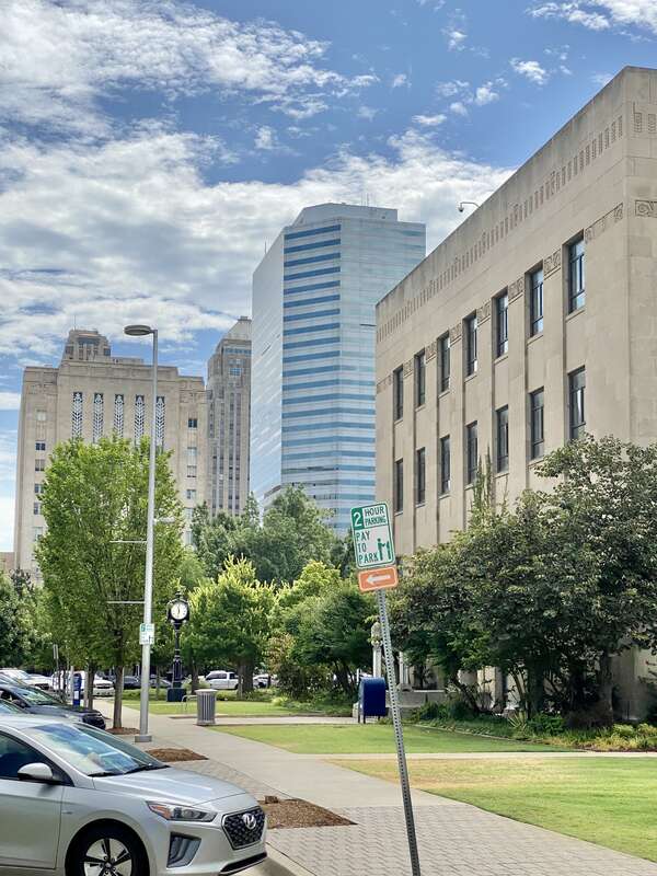 Oklahoma County Courthouse (Layton and Forsyth, 1937), Oklahoma Tower (I. M. Pei and Partners and Morris-Aubry, 1982), and Oklahoma City Hall (Allied Architects, 1936-1937) visible in the background.