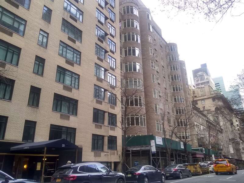 Rockefeller Apartments (right), eastward view, on West 54th Street in Manhattan, New York, seen in March 2021.