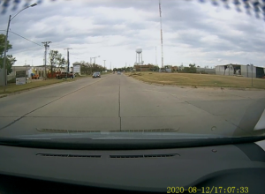On the right, a Collins Aerospace building damaged in the derecho in Cedar Rapids, IA.