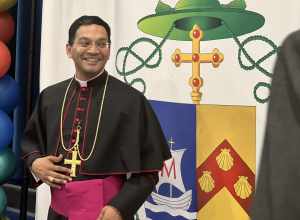 Fernandes greeting people following his episcopal ordination in 2022