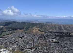 Aerial view of South San Francisco and San Bruno Mountain from the south on departure from SFO