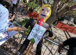 Swamp thing, sign, Tax March, Downtown Los Angeles, California, USA