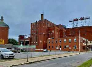 The West End Brewing Company, otherwise known as the F.X. Matt Brewing Company or the Saranac Brewery, at 811 Edward Street in Utica, New York, as seen from the corner of Varick Street on an August 2021 afternoon. The company traces its history to