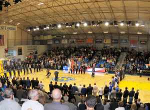 SANTA CRUZ, Calif. --
Military service members of the color guard from the Presidio of Monterey march into position to display the colors during the playing of the national anthem at the Santa Cruz Warriors Basketball Team's Military Appreciation