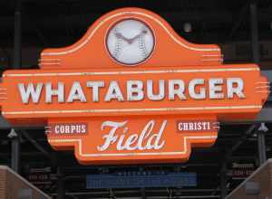 Whataburger Field sign located in Corpus Christi, TX; at the bottom, it reads "Welcome to the Home of the Hooks"