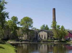 The Hilgen-Wittenberg Woolen Mill complex in Cedarburg, Wisconsin. National Registered Historic Place. View looking west across the mill pond.