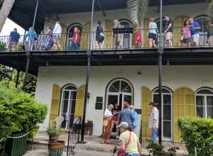 Tourists visiting the Hemingway House in Key West, Florida. Photo by Jim Heaphy.