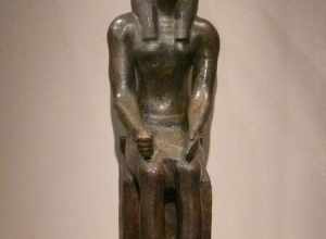 Falcon headed statuette wearing the crown of Upper and Lower Egypt, probably Horus, the incarnation of the living king.