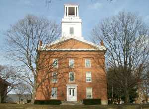 Erwin Hall on the campus of Mareitta College in Marietta, Ohio. The front entrance facing 4th Street is pictured. This facade faces southwest. The building is on the NRHP for Washington County. Taken March 10, 2010.