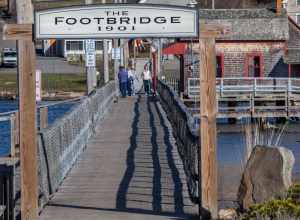 This wooden footbridge extends across the harbor in Boothbay Harbor, Maine. HFF