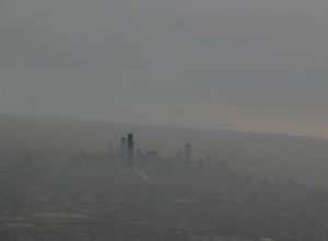 This photo doesn't do the scene justice.  Chicago's skyline looked really cool rising out of the smog, fog, and humidity layer.
Chicago, a city in the U.S. state of Illinois, is the third most populous city in the United States and the most populous