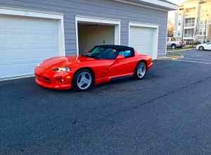 1994 Dodge Viper RT10 with its soft top and side windows on.