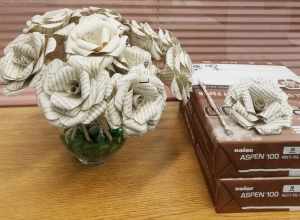 Roses made from upcycled library books.