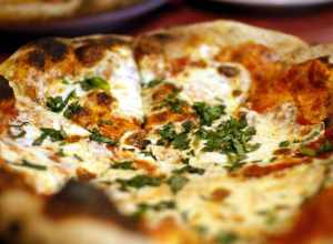 A Margarita pizza from Zeffiro's. Just the basics: tomatoes, mozzarella, and basil. From Las Cruces' new bakery/pizza joint, Zeffiro. It took much too long for a brick-oven pizza place to come to town.