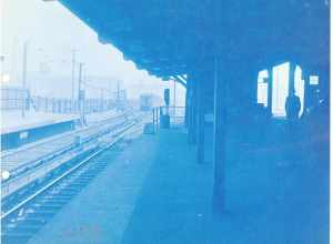 View northeast from the outbound platform at Everett station in April 1927, showing a train on the tail tracks